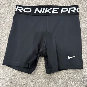 Nike Black Compression Shorts with Subtle Gray Swoosh Detail youth girls Large